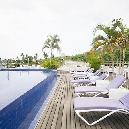 Taman Unique Hotel Сенггиги Экстерьер фото