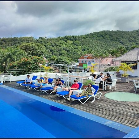Taman Unique Hotel Сенггиги Экстерьер фото