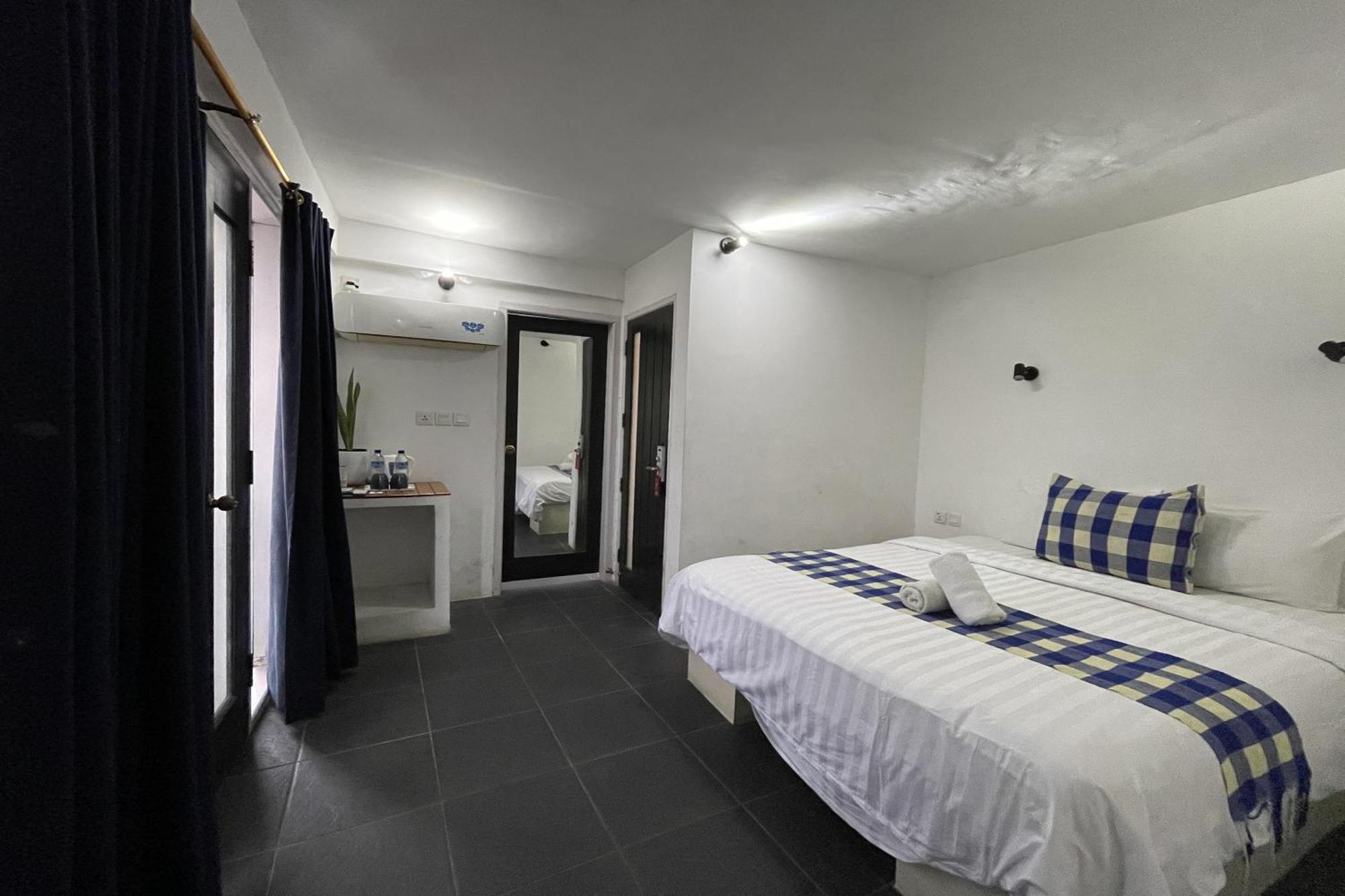 Taman Unique Hotel Сенггиги Экстерьер фото